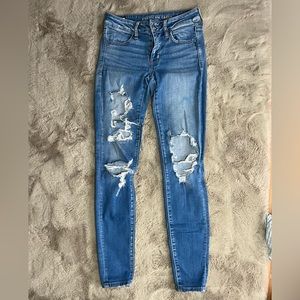 Light Wash American Eagle Ripped Skinny Jeans